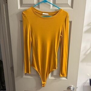 Elodie Mustard Long Sleeve Bodysuit